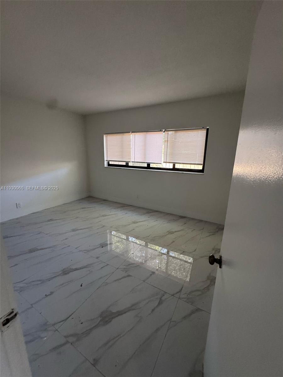5731 Northeast 18th Avenue, Unit 4 Fort Lauderdale, FL 33334 - Photo 7 of 13 a view of room