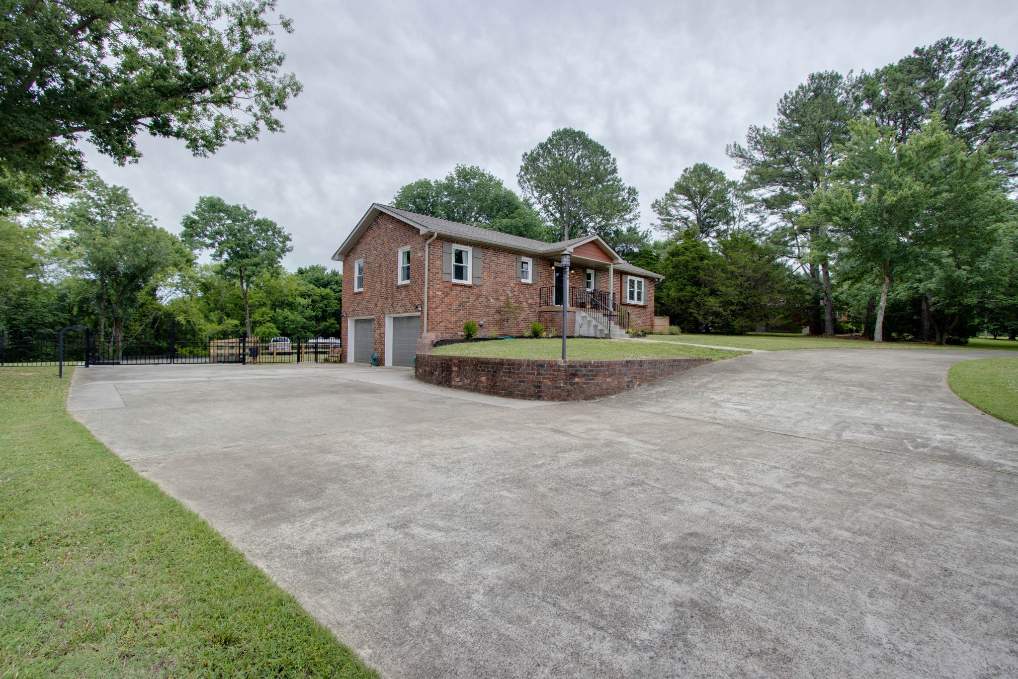 860 Vanderbilt Road Mount Juliet, TN 37122 - Photo 6 of 65 a front view of a house with a yard