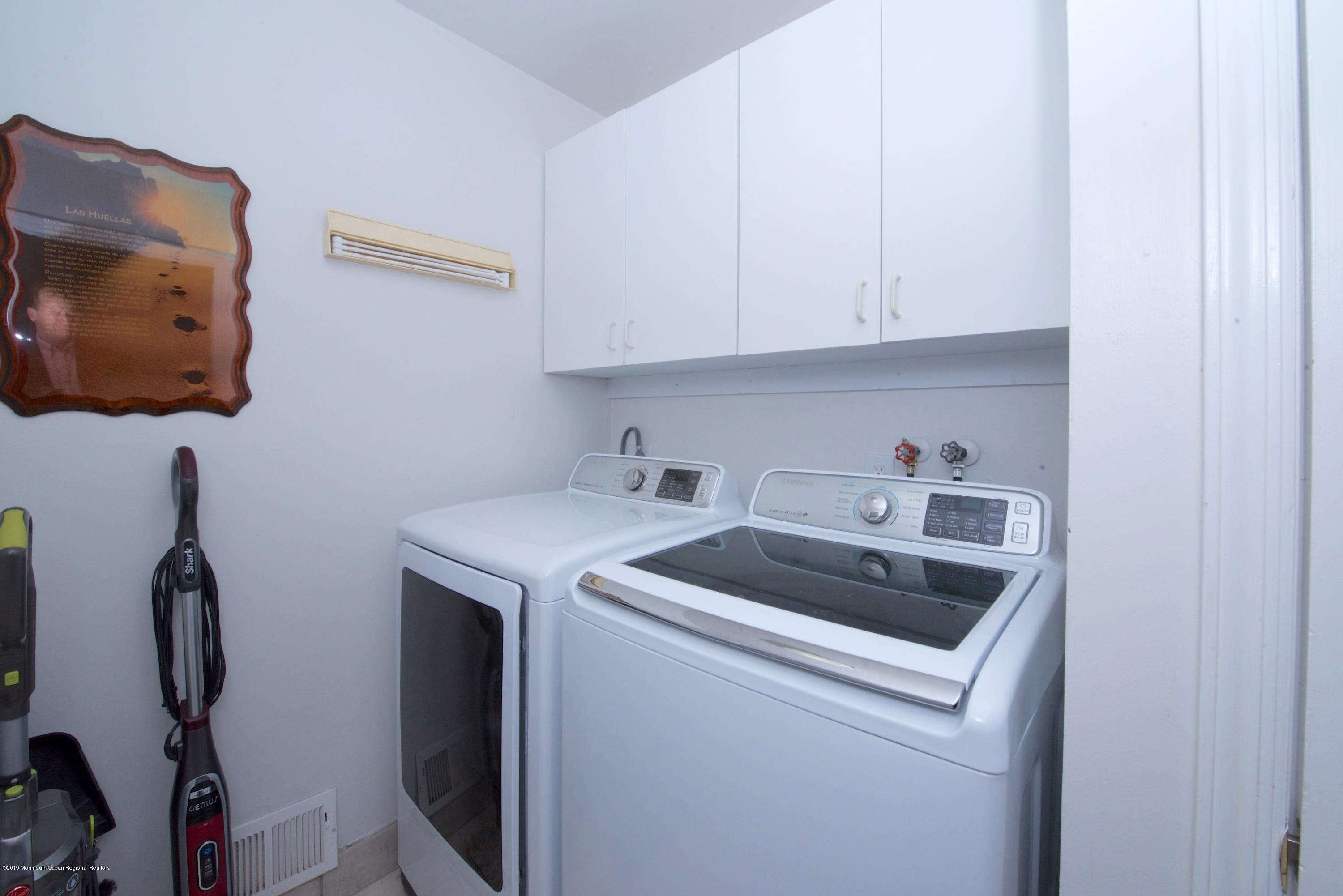 131 Millstone Road Millstone Township, NJ 08535 - Photo 13 of 27 a utility room with dryer and washer