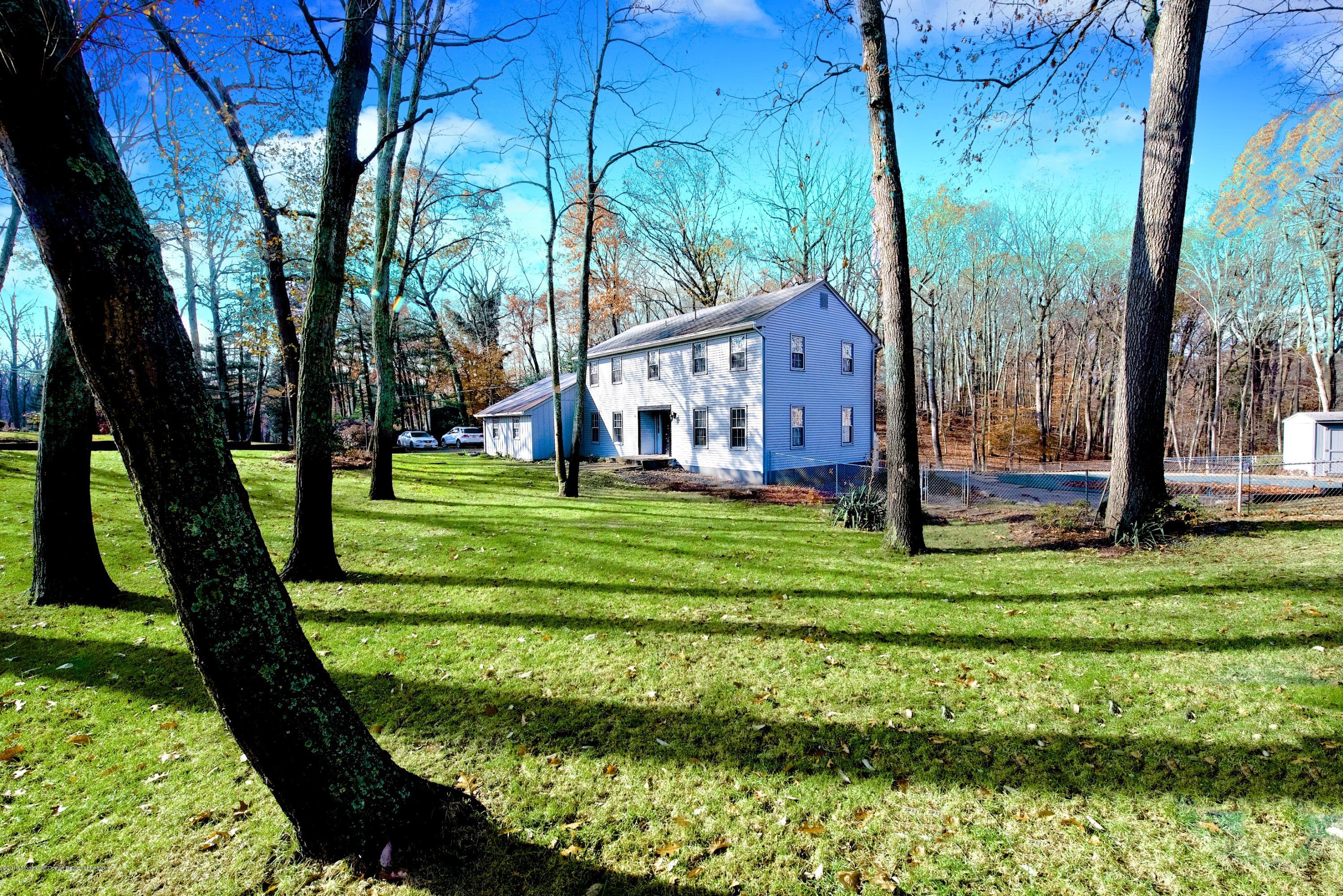 131 Millstone Road Millstone Township, NJ 08535 - Photo 2 of 27 a view of a house with a big yard