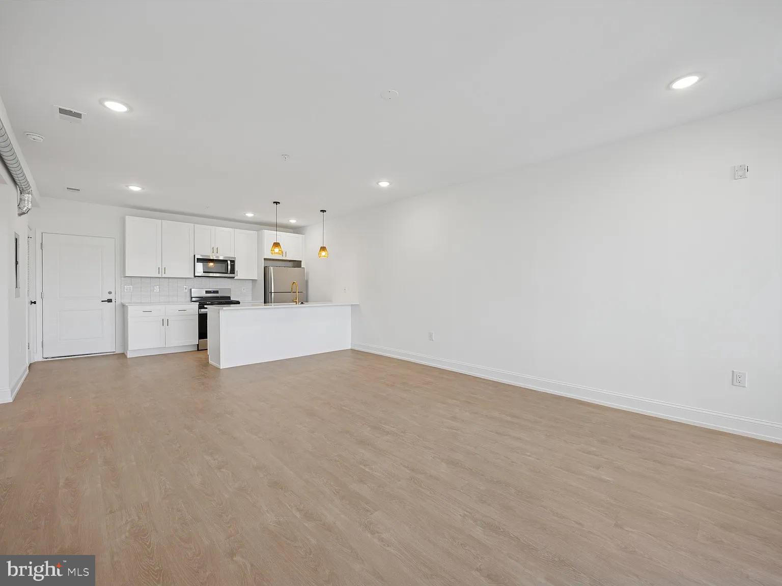 1614-20 Ridge Avenue, Unit 504 Philadelphia, PA 19130 - Photo 10 of 17 a view of a kitchen with a sink and a refrigerator