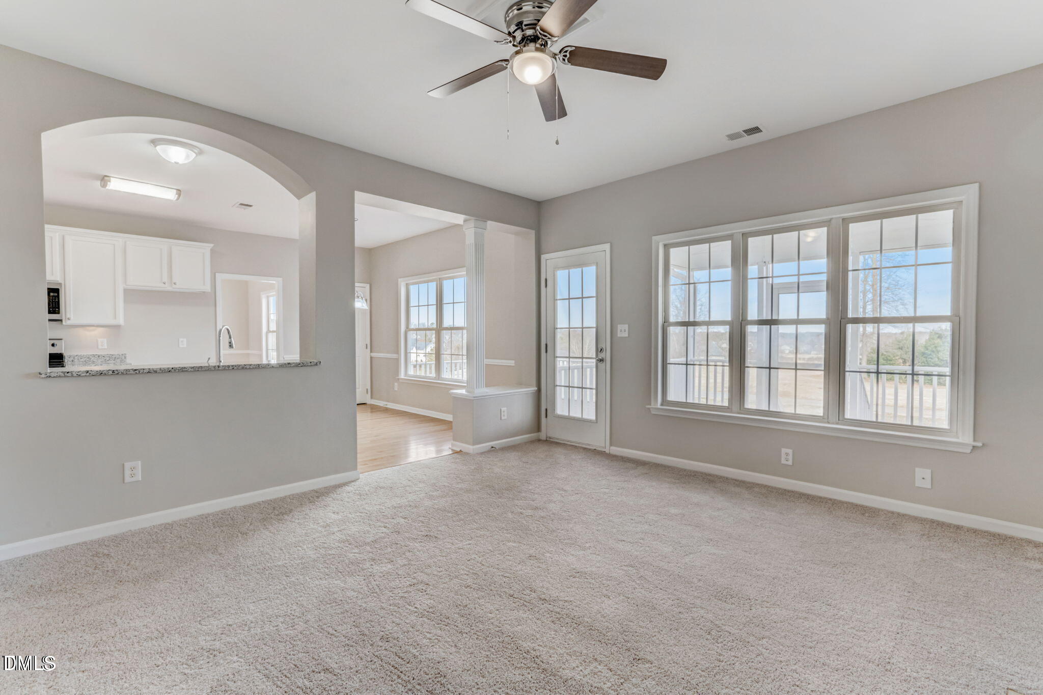 480 Seastone Street Raleigh, NC 27603 - Photo 14 of 26 a view of an empty room with a window