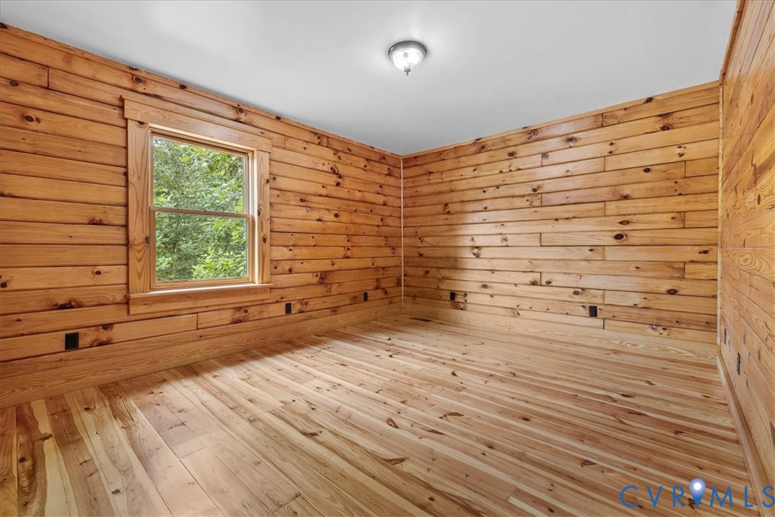 18901 Shippings Road Dewitt, VA 23840 - Photo 28 of 50 a view of an empty room and window with wooden floor