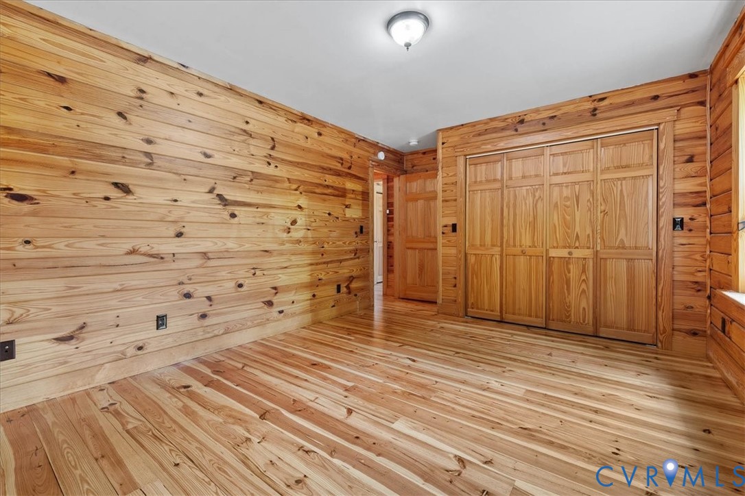 18901 Shippings Road Dewitt, VA 23840 - Photo 29 of 50 en empty room with wooden floor