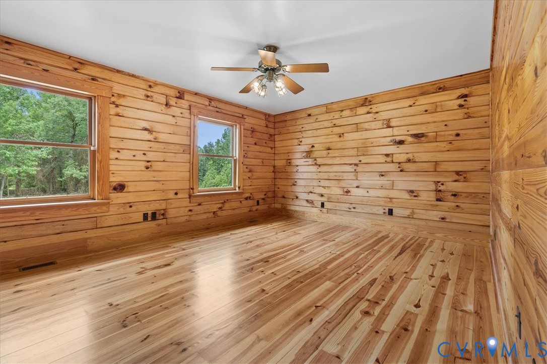 18901 Shippings Road Dewitt, VA 23840 - Photo 30 of 50 a view of empty room with wooden floor and fan