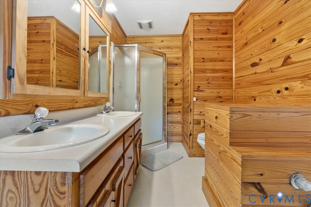 18901 Shippings Road Dewitt, VA 23840 - Photo 33 of 50 a bathroom with a sink and a shower