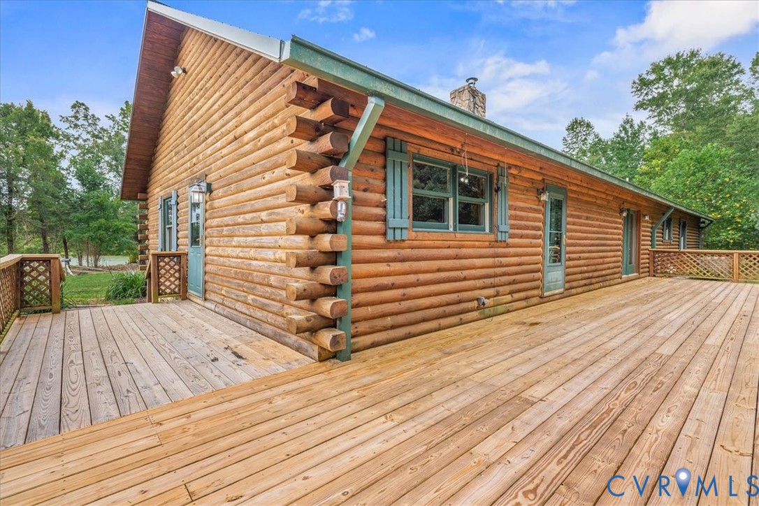 18901 Shippings Road Dewitt, VA 23840 - Photo 34 of 50 a backyard of a house with wooden floor yard and outdoor seating