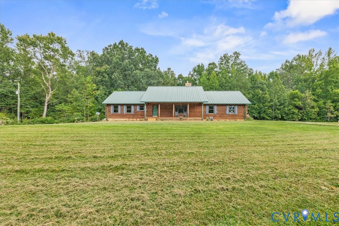 18901 Shippings Road Dewitt, VA 23840 - Photo 4 of 50 a backyard of a house with lots of green space