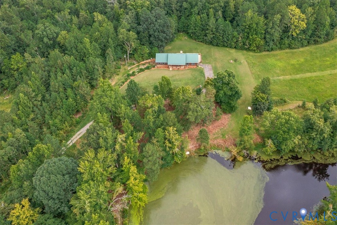 18901 Shippings Road Dewitt, VA 23840 - Photo 7 of 50 an aerial view of a house with a yard and outdoor seating