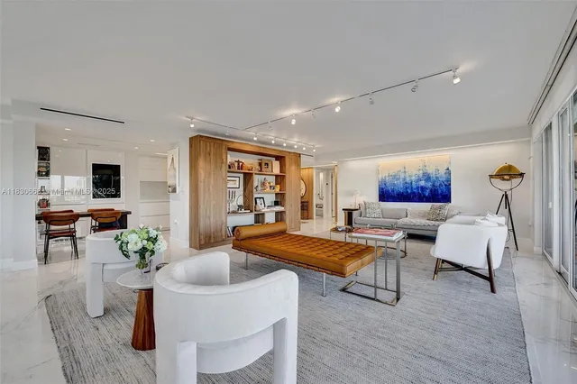 a kitchen with a sink and a refrigerator