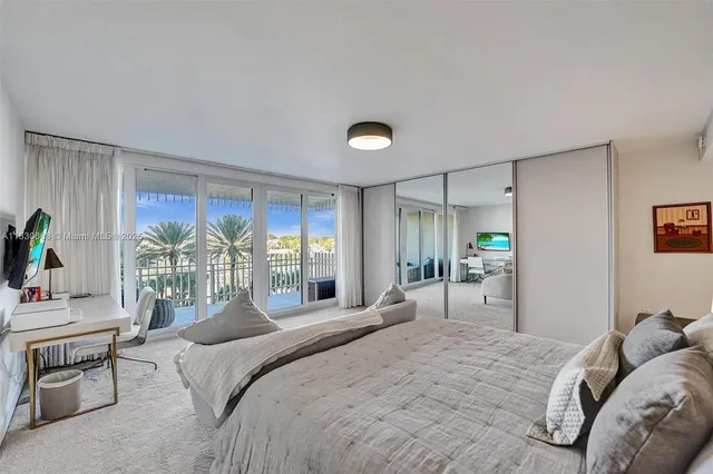 a view of a balcony with furniture