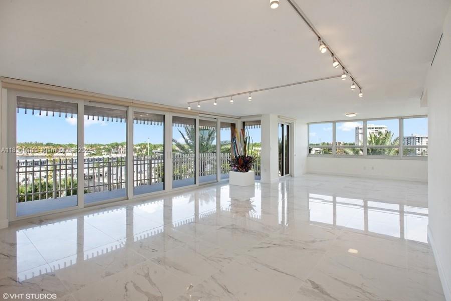 2 Grove Isle Drive, Unit B410 Miami, FL 33133 - Photo 4 of 43 a view of a living room and window