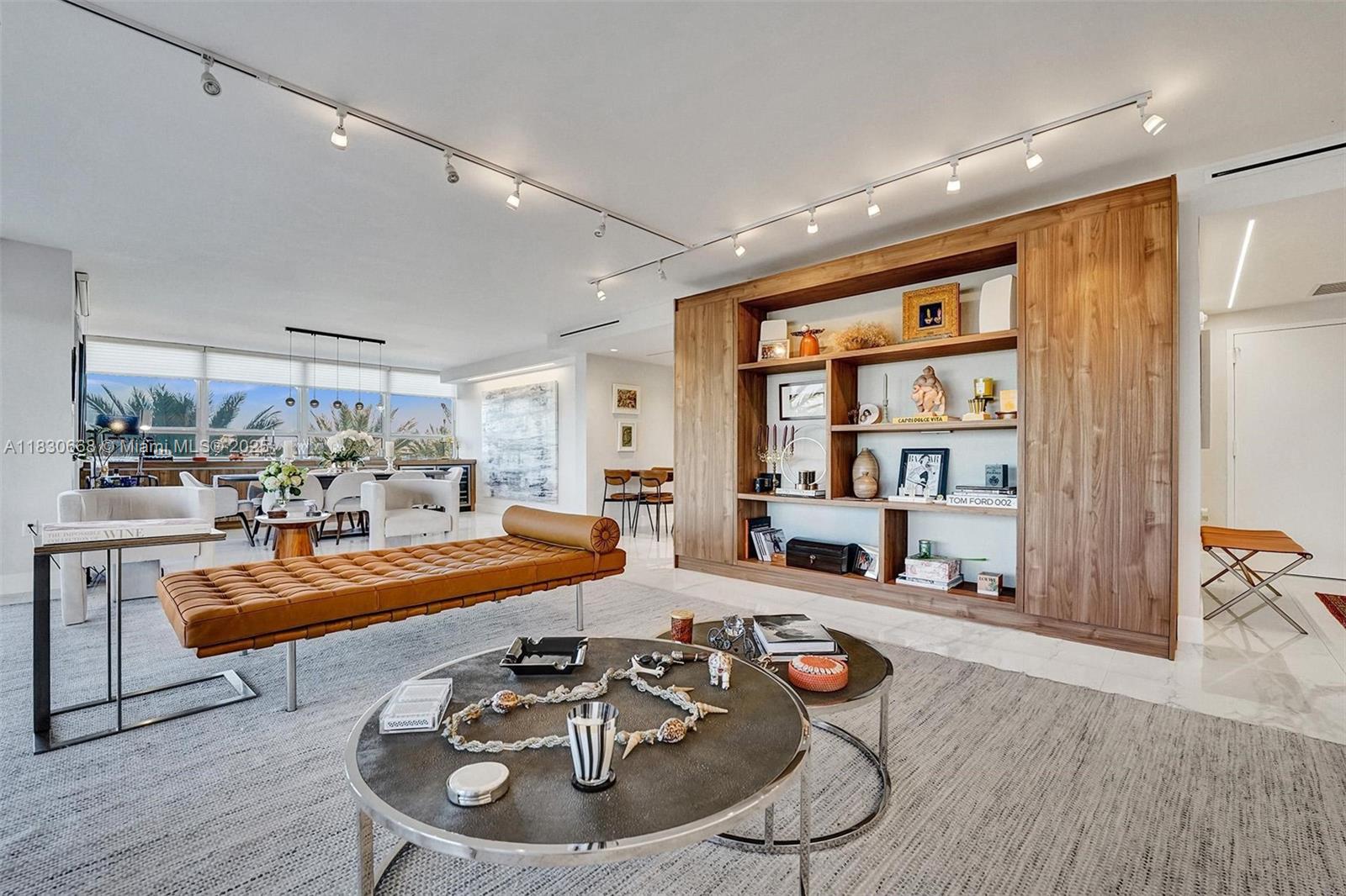 2 Grove Isle Drive, Unit B410 Miami, FL 33133 - Photo 8 of 43 a room with furniture and wooden floor