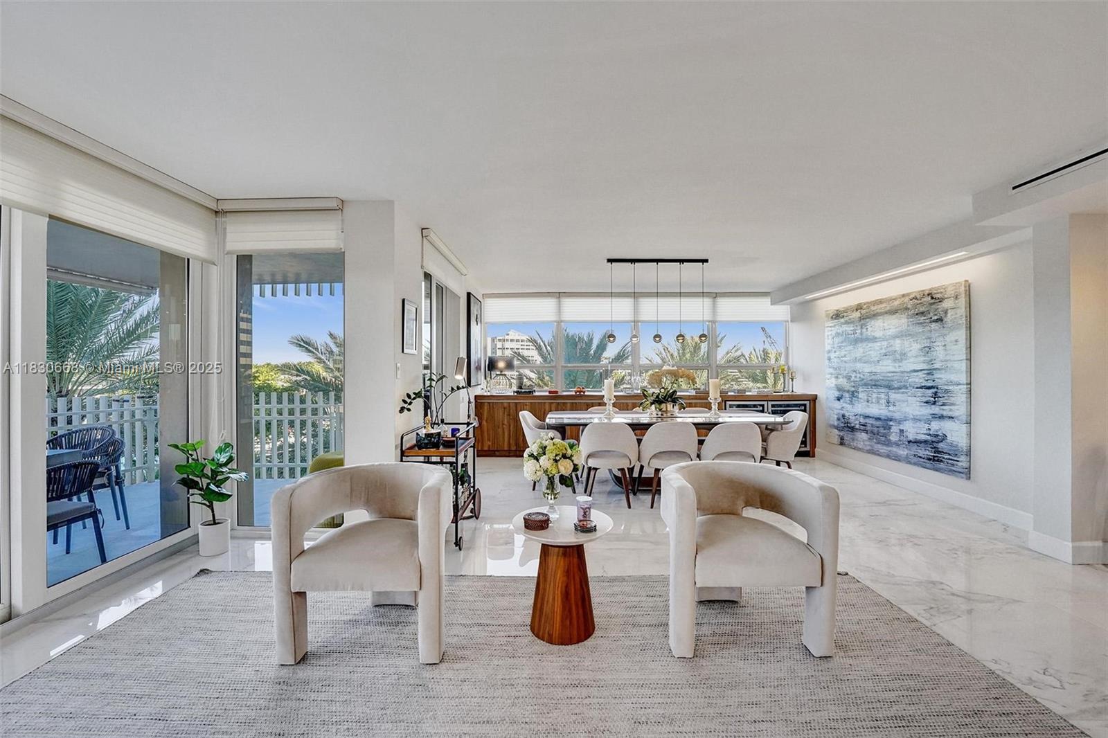 2 Grove Isle Drive, Unit B410 Miami, FL 33133 - Photo 9 of 43 a living room with furniture and a potted plant