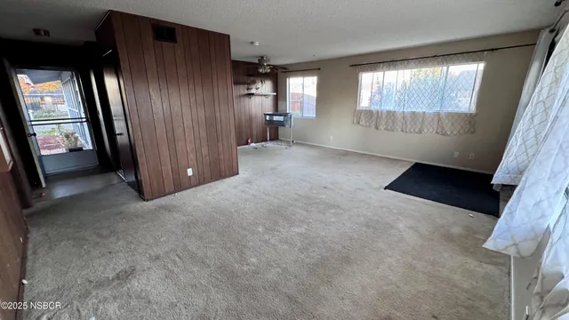 wooden floor and windows in an empty room
