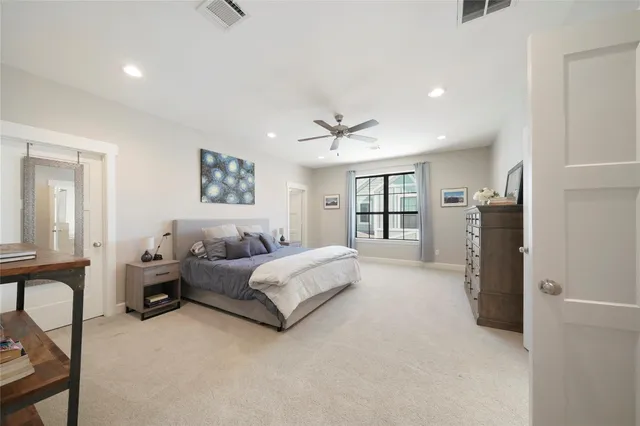 a bathroom with a tub sink and shower