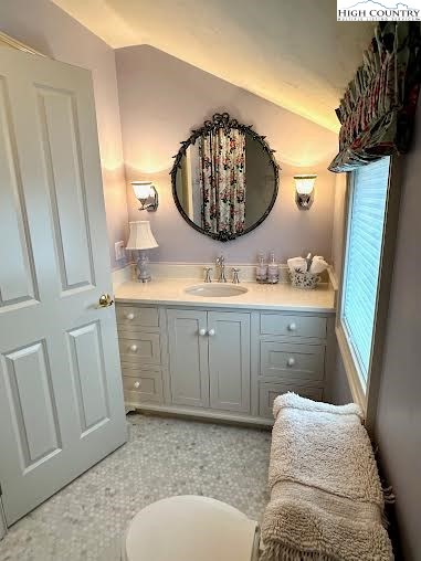 520 East Landing Ridge Circle Jefferson, NC 28640 - Photo 35 of 50 a bathroom with a sink a mirror and vanity