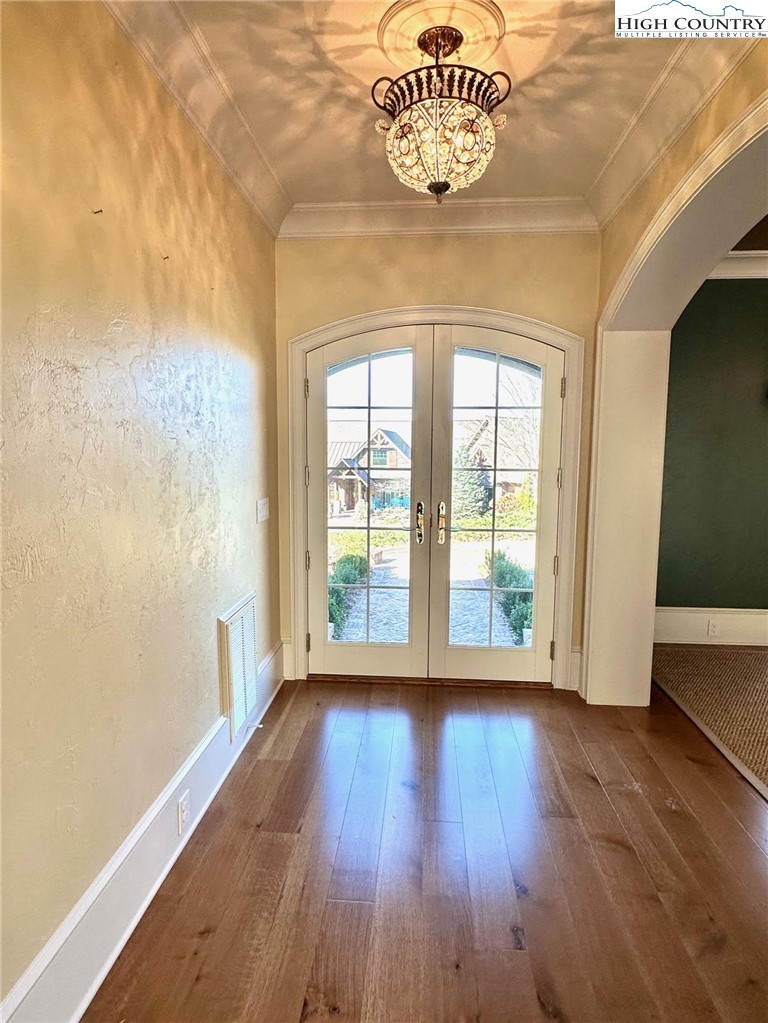 520 East Landing Ridge Circle Jefferson, NC 28640 - Photo 4 of 50 a view of an empty room with wooden floor and a window