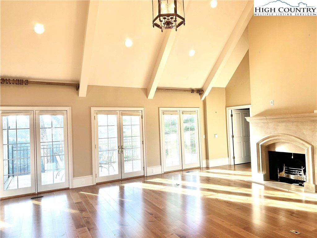 520 East Landing Ridge Circle Jefferson, NC 28640 - Photo 5 of 50 a view of an empty room with exposed radiator and fireplace