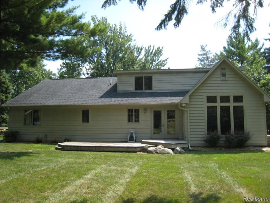 8568 Rucker Road Grosse Ile, MI 48138 - Photo 2 of 24 Rear View
