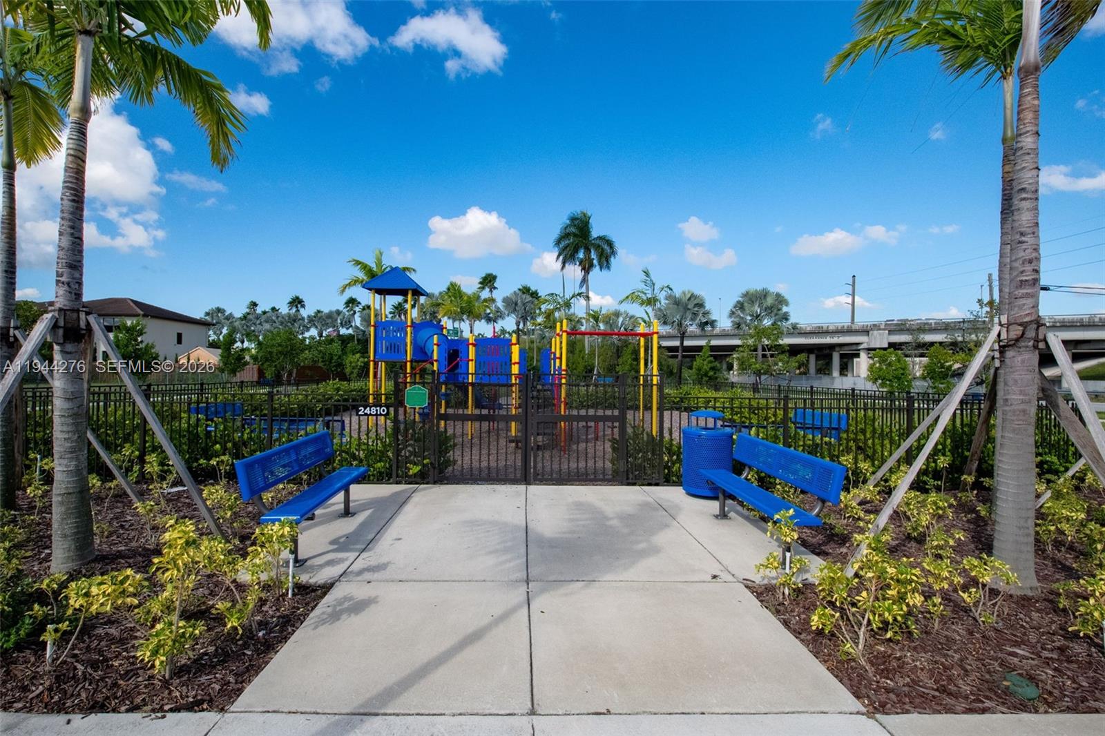 24985 Southwest 107th Court Homestead, FL 33032 - Photo 21 of 22 a view of a park with a slide