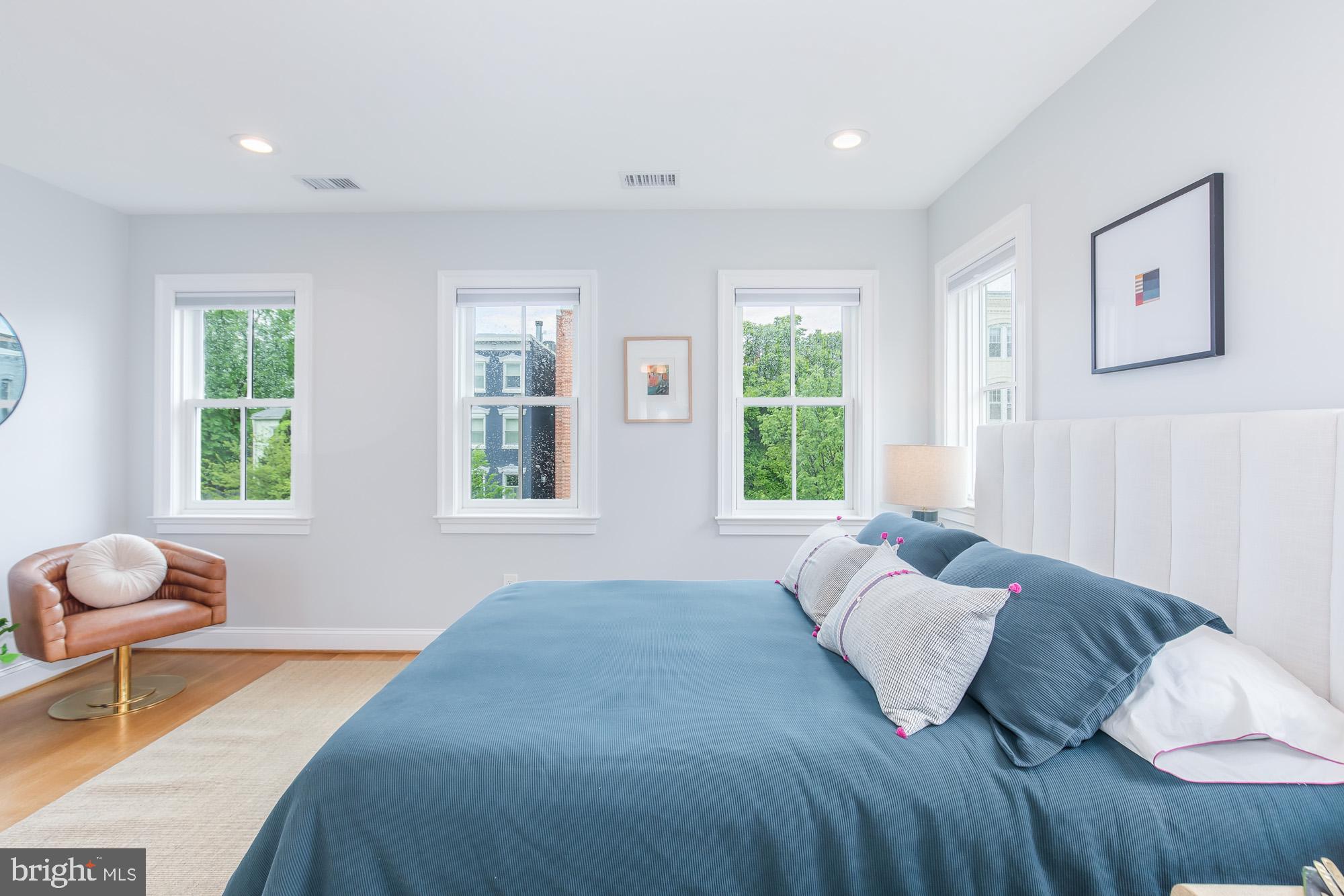 420 4th Street Southeast Washington, DC 20003 - Photo 22 of 31 a bedroom with a bed and a window