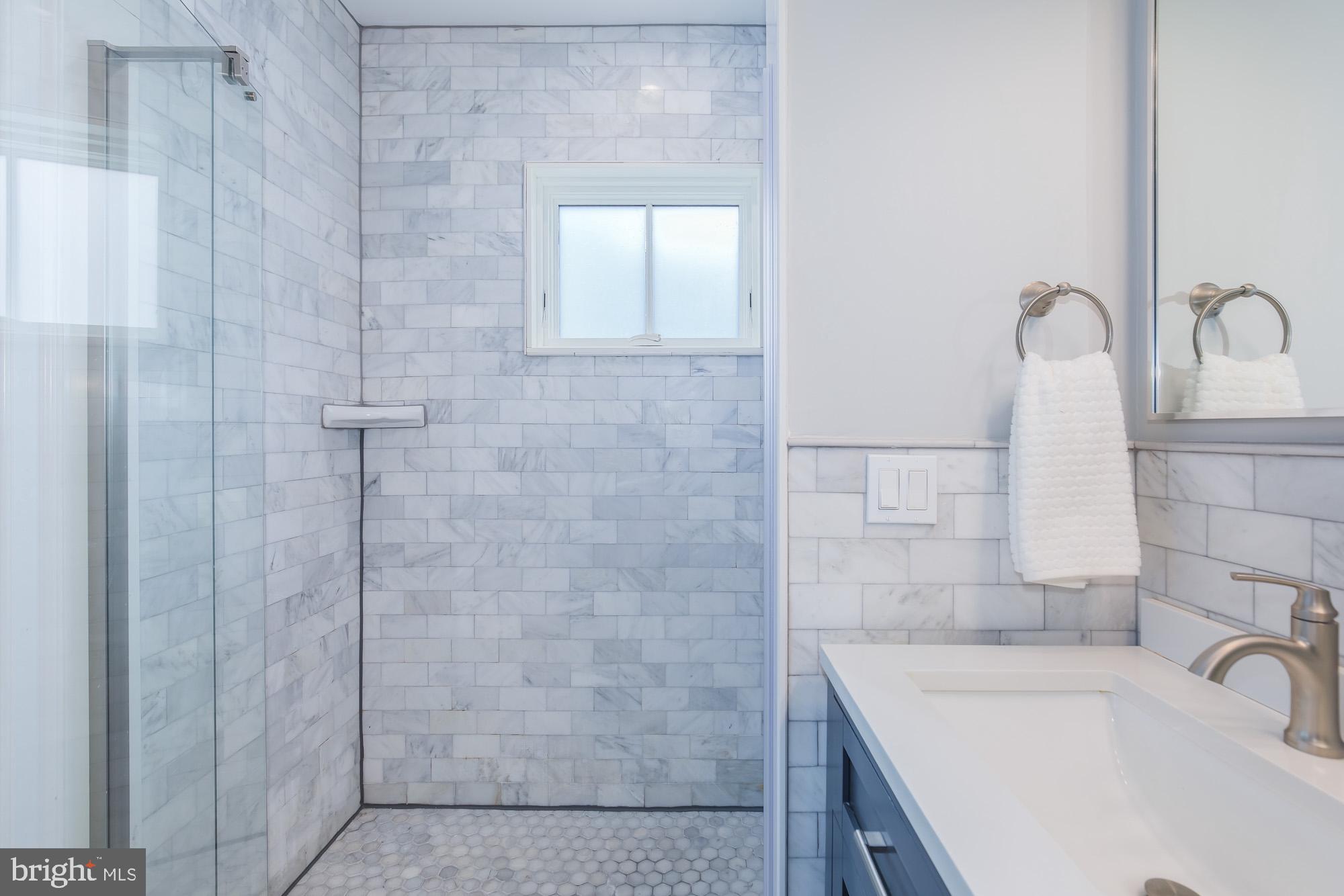 420 4th Street Southeast Washington, DC 20003 - Photo 24 of 31 a bathroom with a sink and a shower