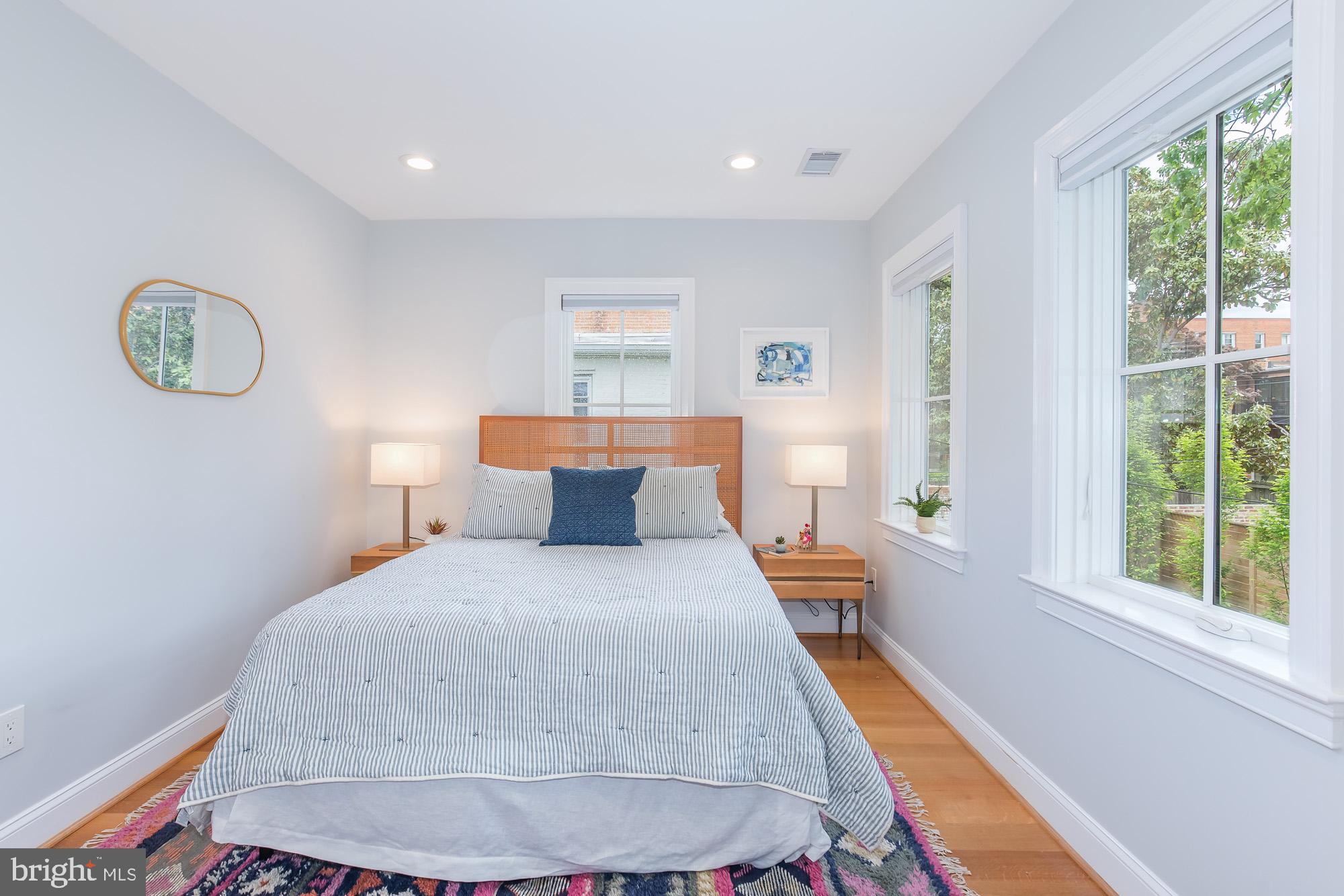 420 4th Street Southeast Washington, DC 20003 - Photo 25 of 31 a bedroom with a bed and window