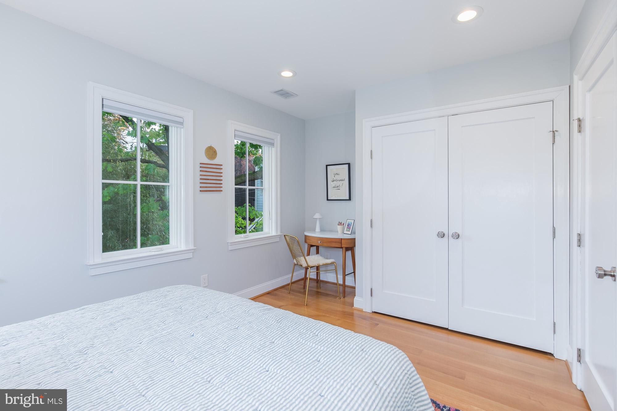 420 4th Street Southeast Washington, DC 20003 - Photo 27 of 31 a bedroom with a bed and a window