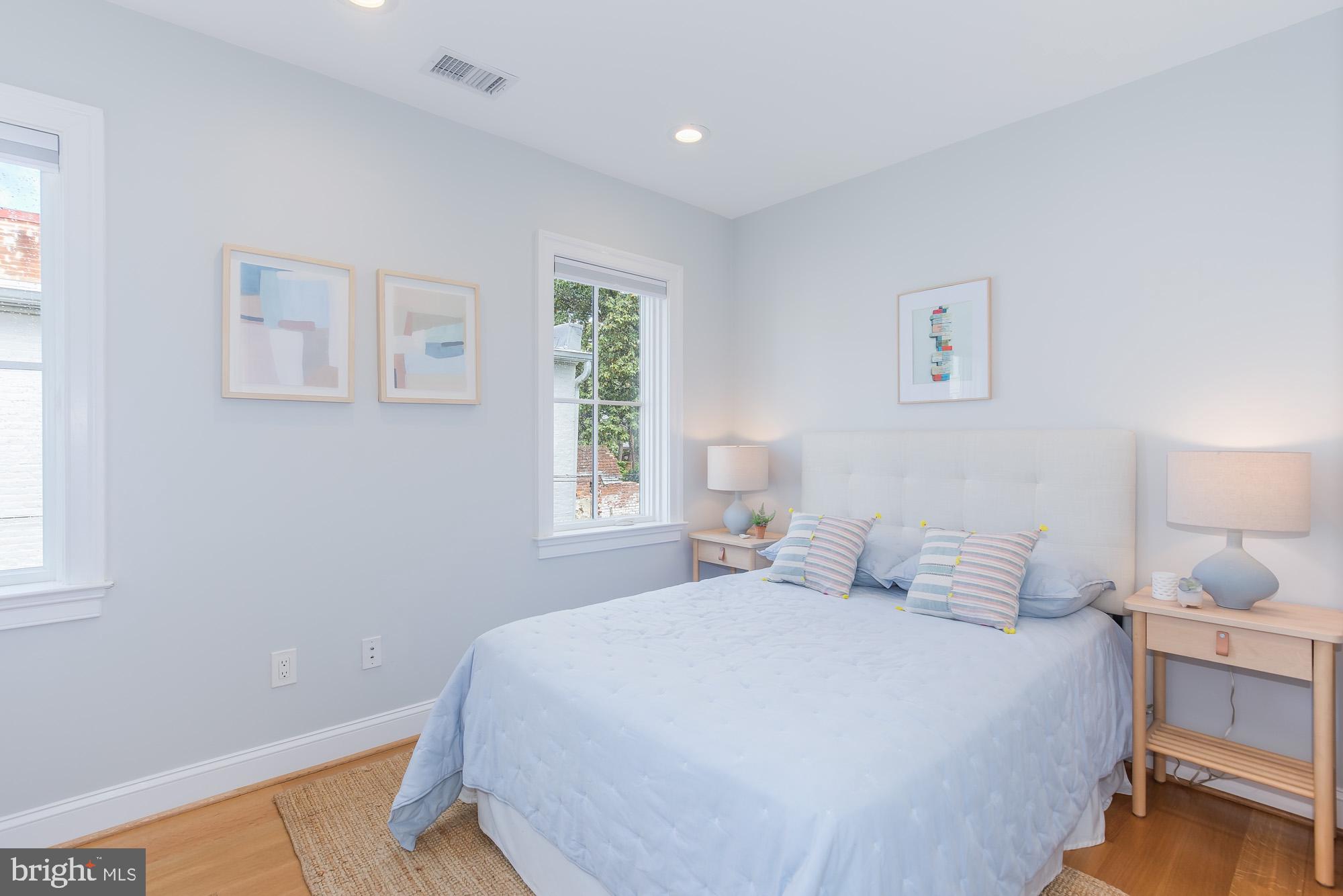 420 4th Street Southeast Washington, DC 20003 - Photo 28 of 31 a bedroom with a bed and a window