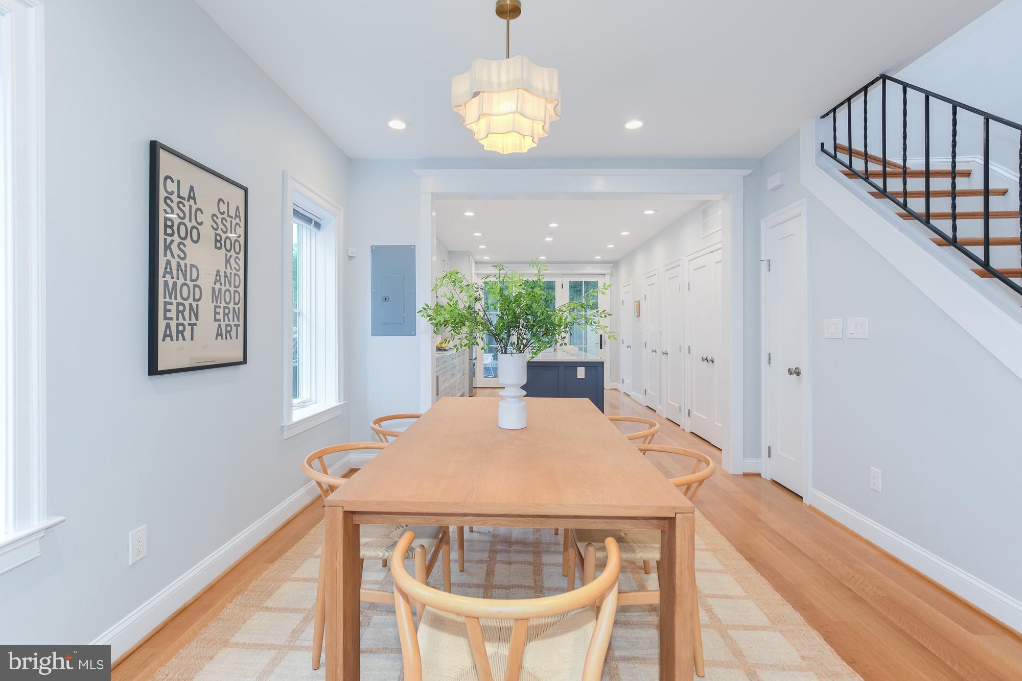 420 4th Street Southeast Washington, DC 20003 - Photo 7 of 31 a view of a dining room with furniture and a chandelier