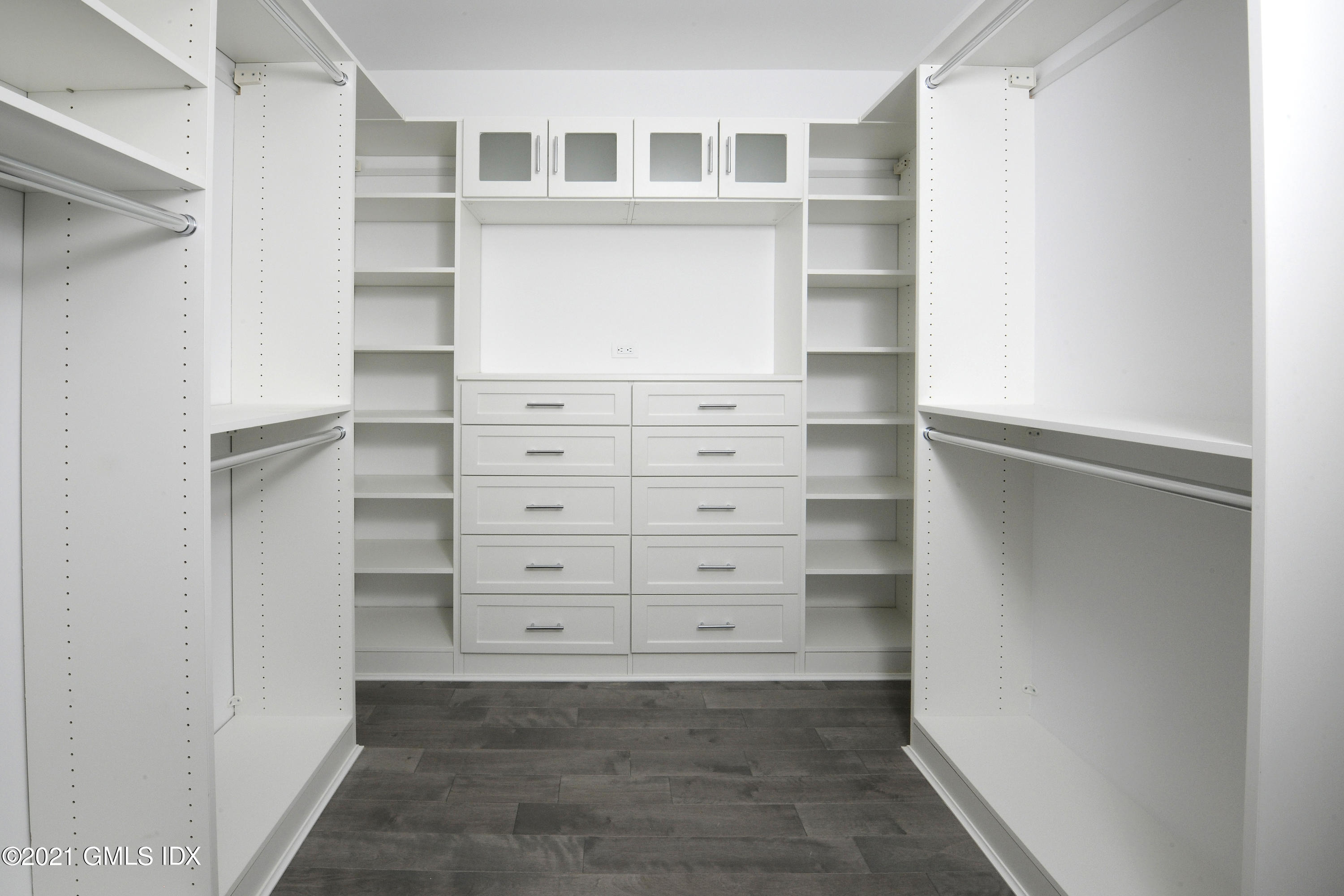 36 Washington Avenue Greenwich, CT 06830 - Photo 18 of 32 a view of walk in closet with empty racks