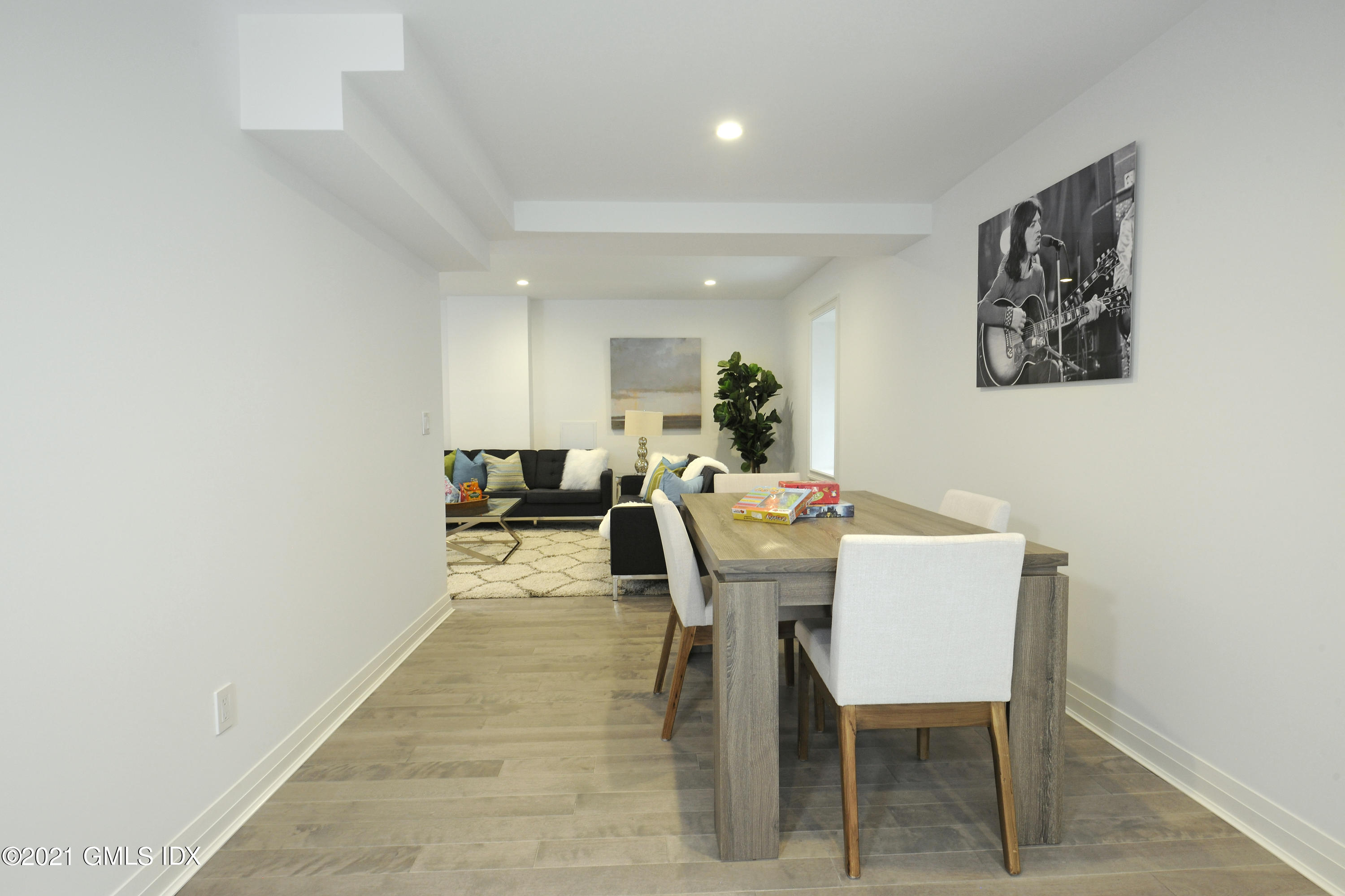 36 Washington Avenue Greenwich, CT 06830 - Photo 27 of 32 a dining room with a table and chairs