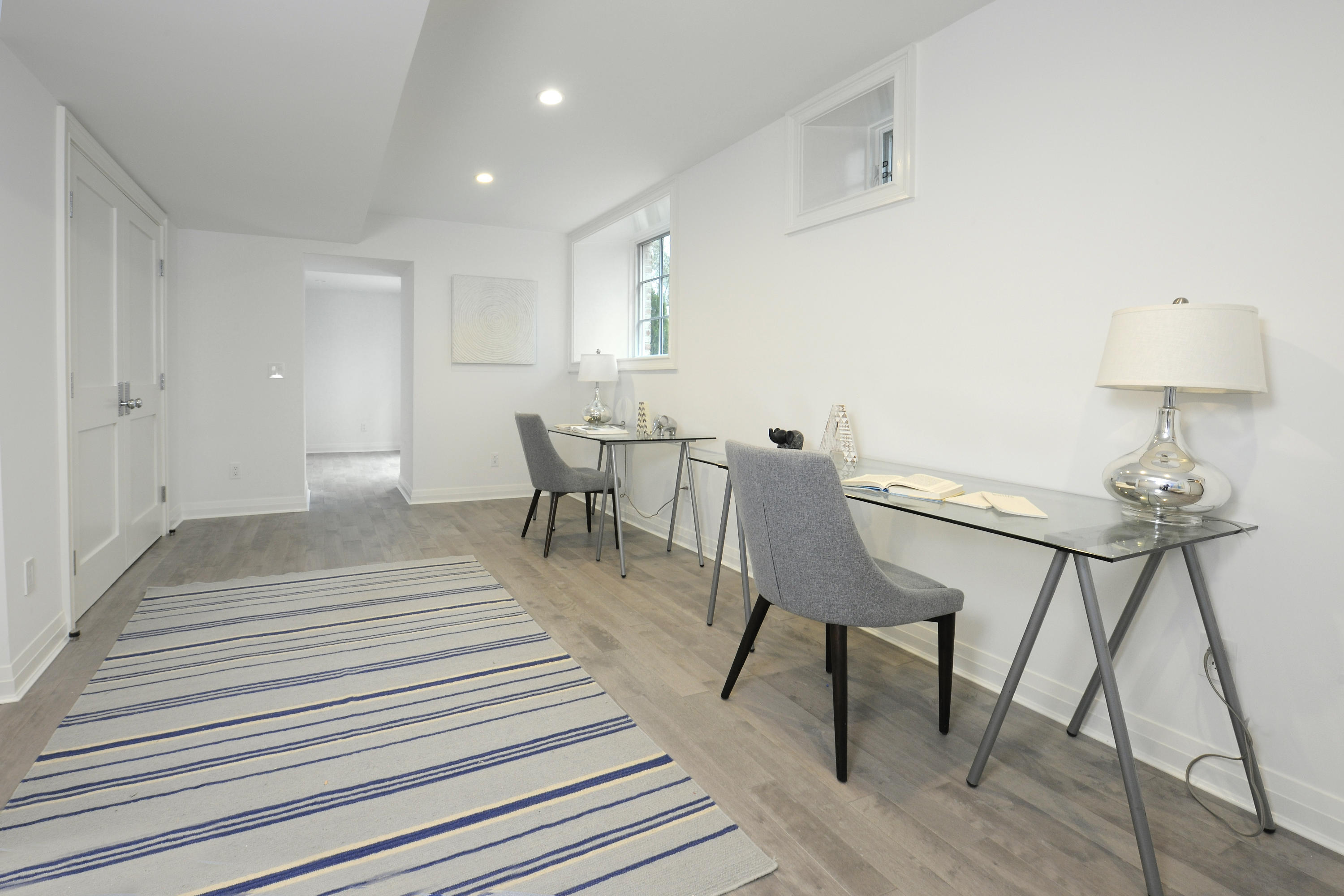 36 Washington Avenue Greenwich, CT 06830 - Photo 28 of 32 a view of a dining room with furniture and wooden floor
