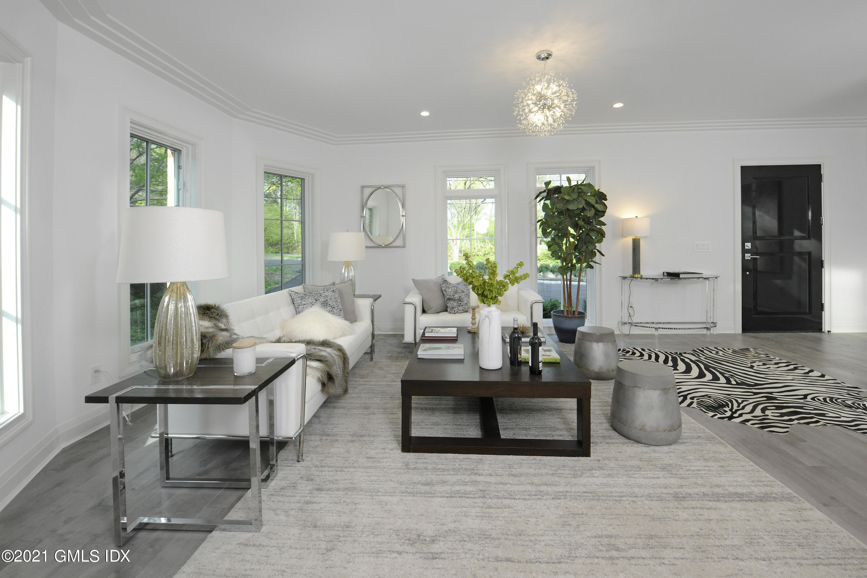 36 Washington Avenue Greenwich, CT 06830 - Photo 3 of 32 a living room with furniture and a table