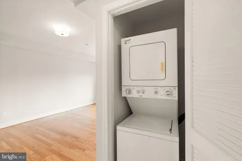 a view of bathroom with a washer and dryer