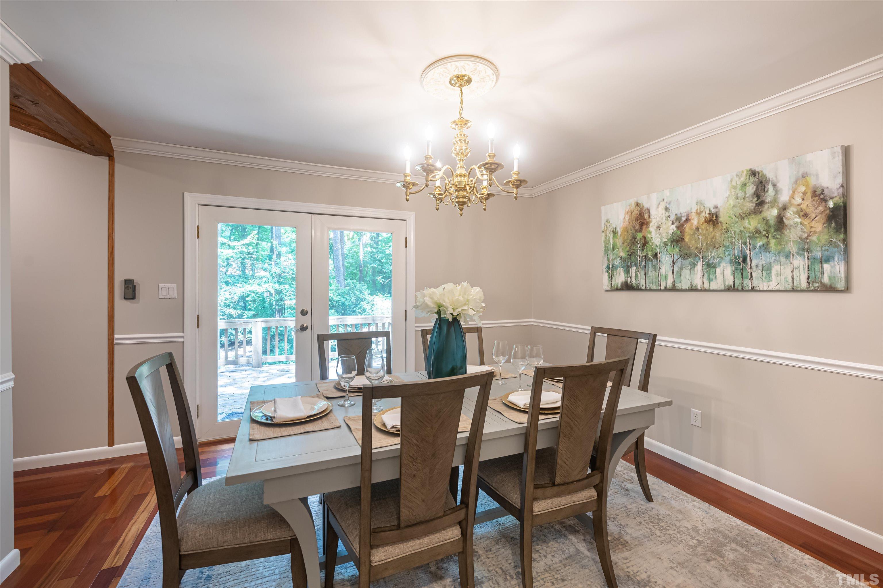 2612 Salisbury Plain Raleigh, NC 27613 - Photo 4 of 22 a view of a dining room with furniture window and outside view