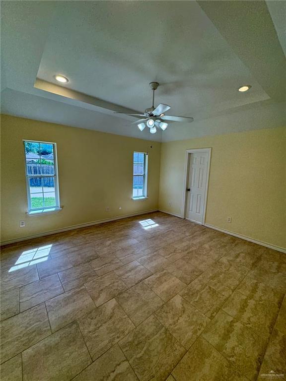2207 Turtle Court Mission, TX 78572 - Photo 16 of 22 a view of an empty room with a chandelier fan