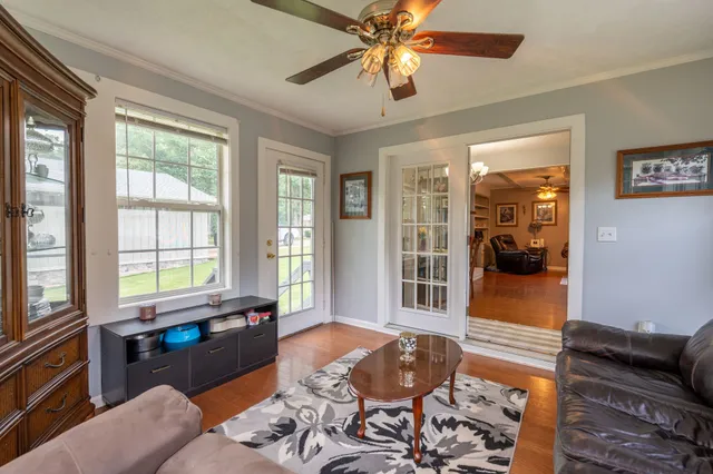 a living room with furniture and a window
