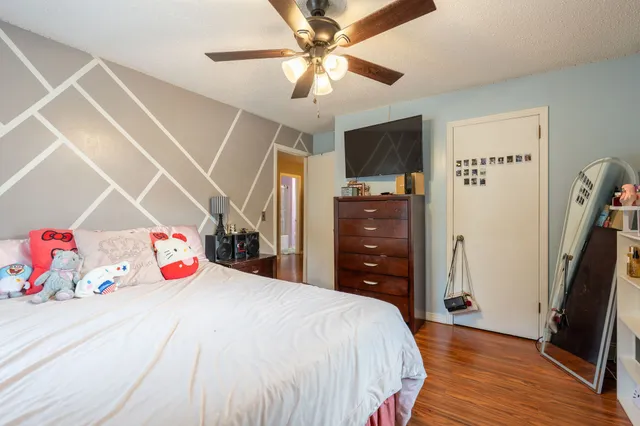 a bedroom with a bed and a walk in closet