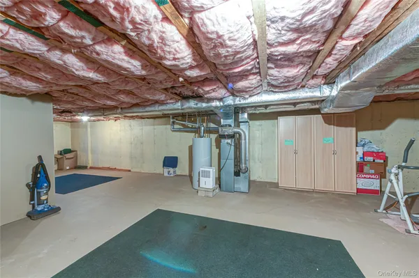 a view of a garage with table and chairs