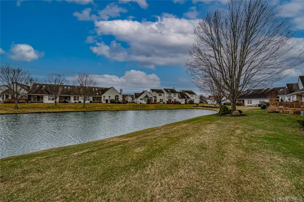 a view of a outdoor sitting area with furniture