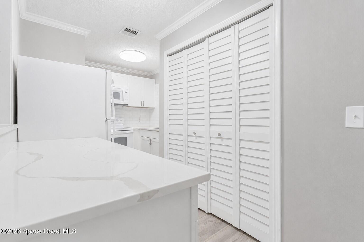 265 Spring Drive, Unit 3 Merritt Island, FL 32953 - Photo 5 of 27 Kitchen-2