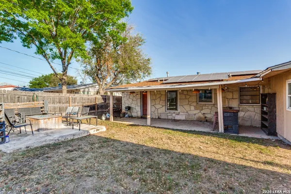 an outdoor view of a house having patio