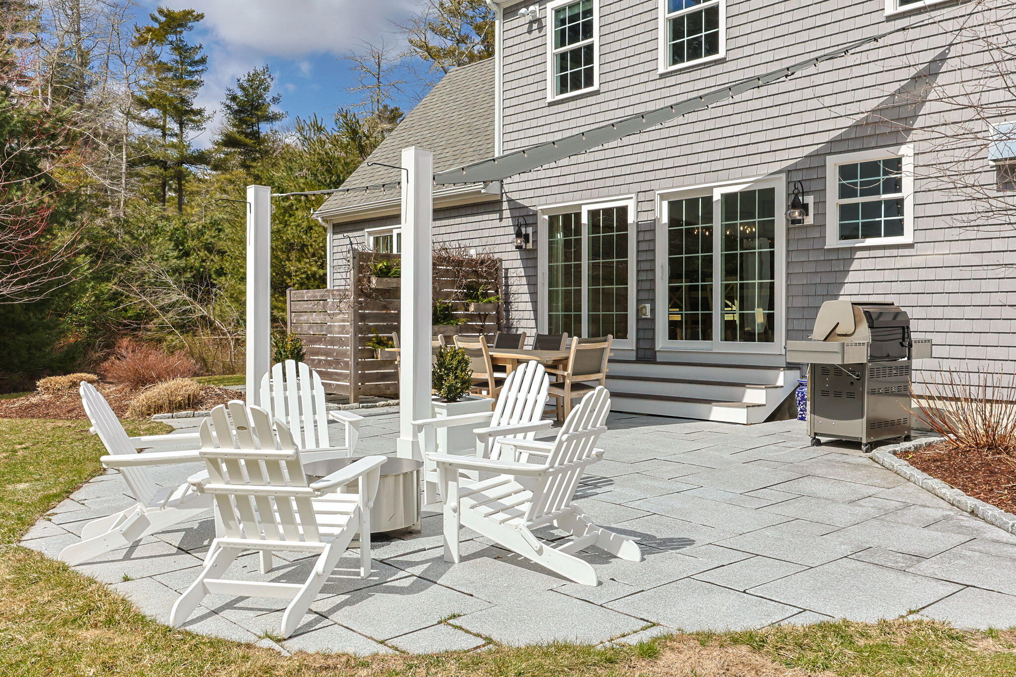 174 Cross Neck Road Marion, MA 02738 - Photo 32 of 41 a view of a house with backyard porch and sitting area