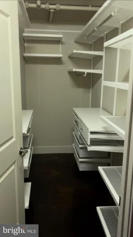 a storage room with washer and dryer