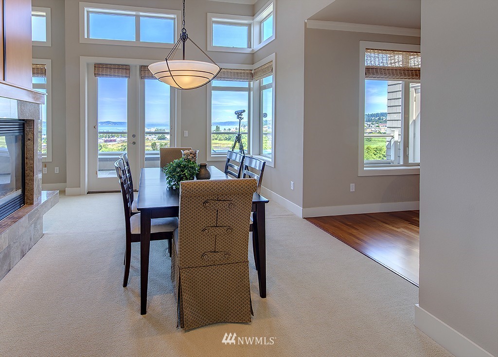 61 Pine Street, Unit 302 Edmonds, WA 98020 - Photo 13 of 25 a view of a livingroom with furniture and window