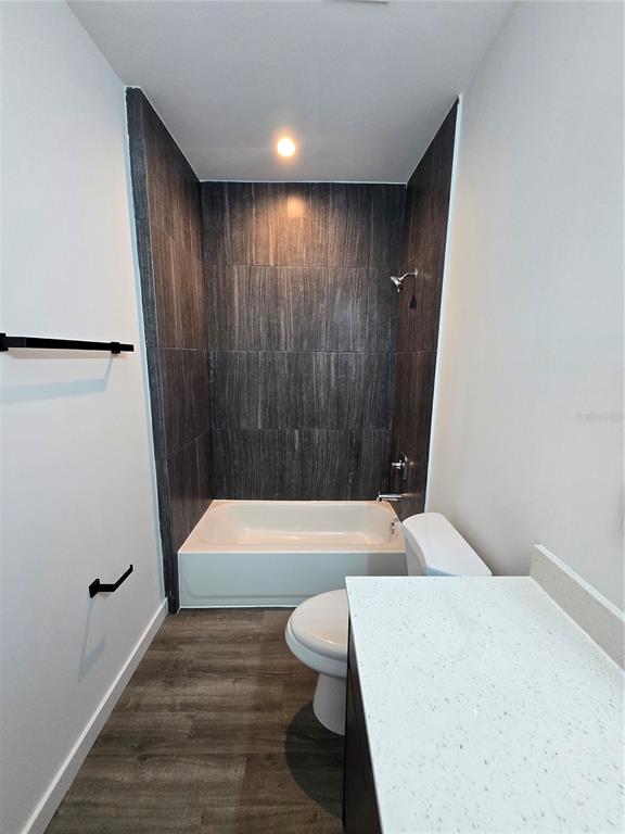 1601 Northwest 29 Road, Unit 3 Gainesville, FL 32605 - Photo 27 of 48 a bathroom with a bathtub and a sink