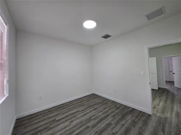 a view of a room with racks on the wall