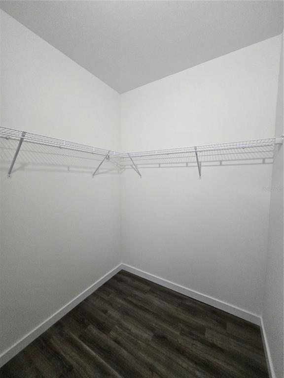 1601 Northwest 29 Road, Unit 3 Gainesville, FL 32605 - Photo 30 of 48 a view of a room with racks on the wall